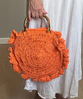 Handmade Raffia Bag – Orange mit Bambusgriff